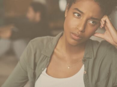 Workplace trauma - Black professional at work.